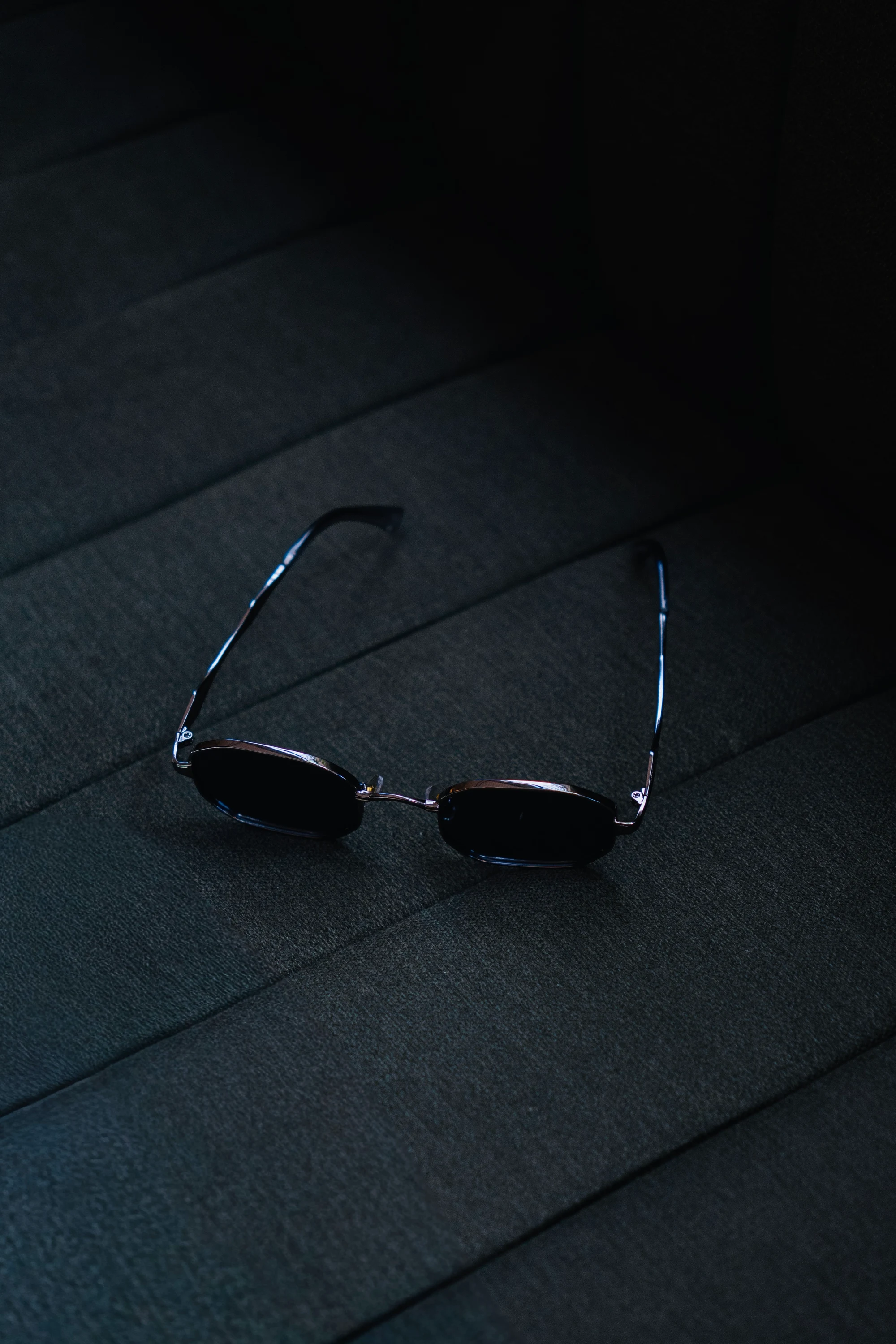 Óculos Ziren em close, lentes e armação em destaque
